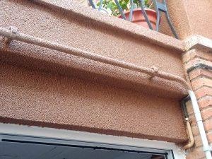 Acabado de fachada con Corcho proyectado